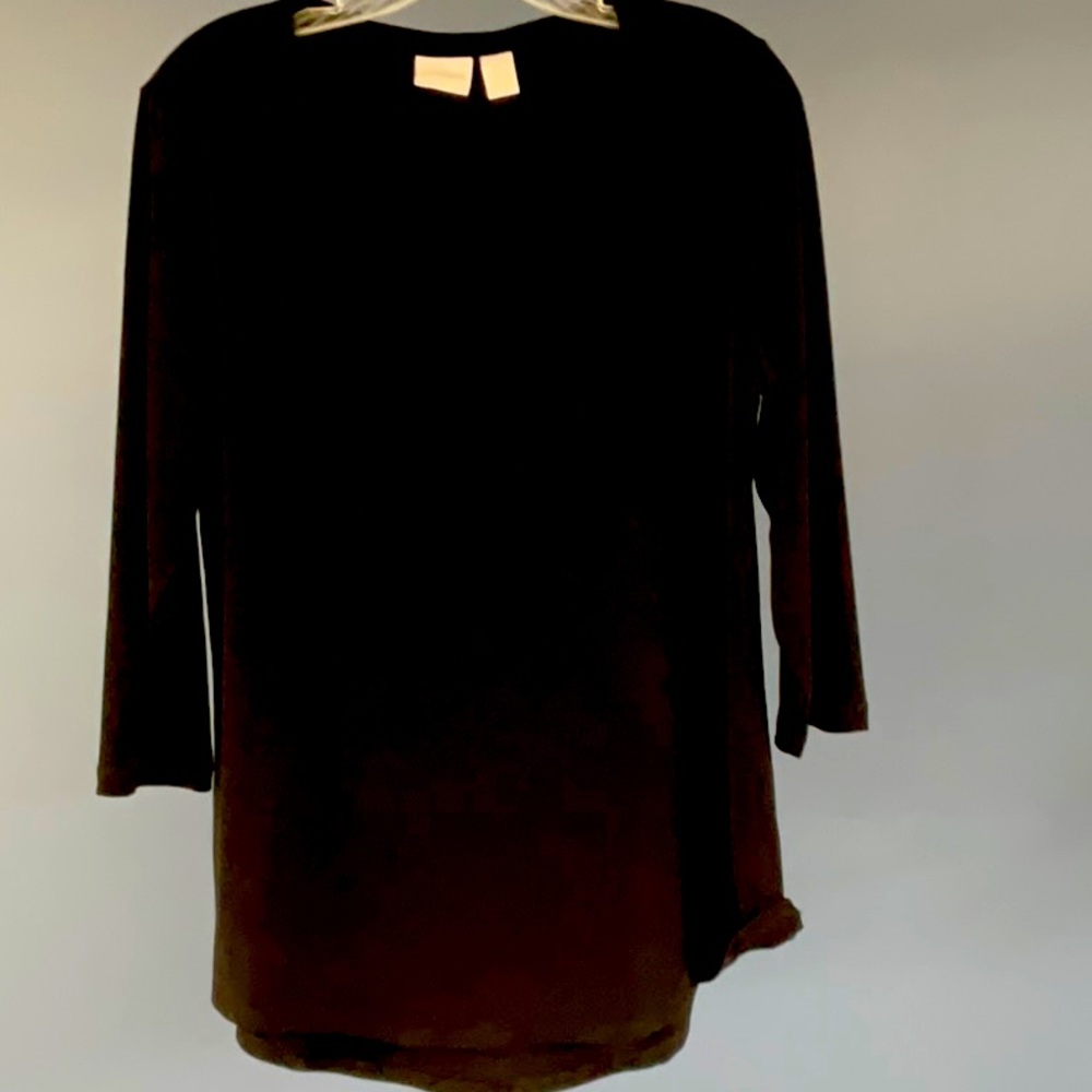 Women’s black Chico’s blouse size 1x.  Polyester 95% and 5% Elastane.